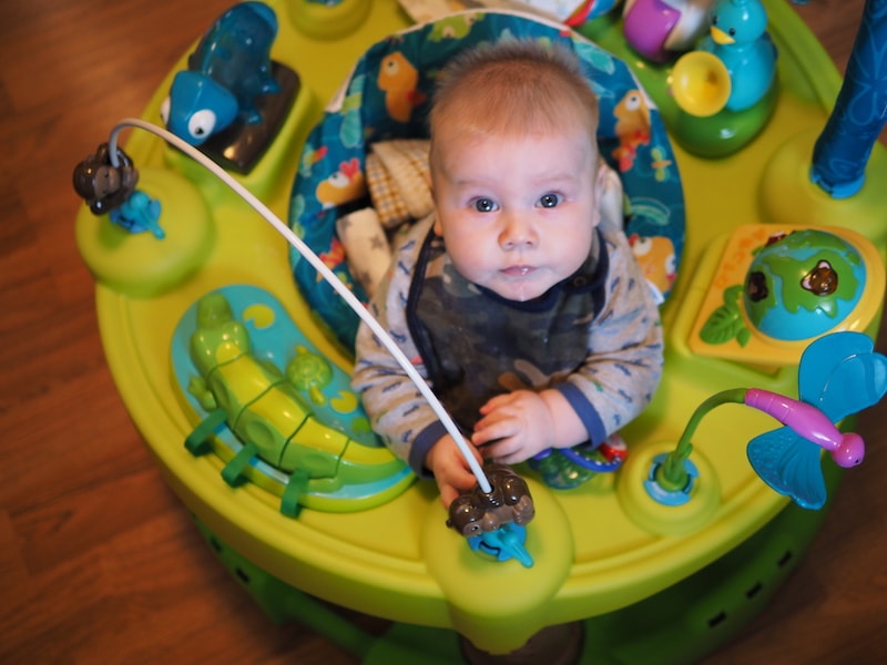 Declan in his Exersaucer